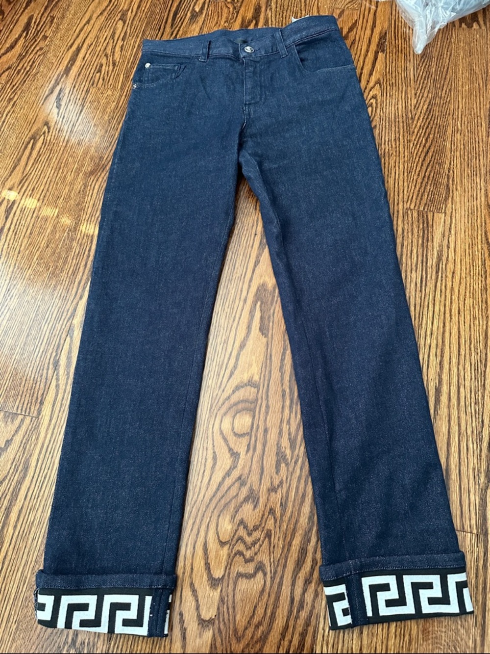 Versace Navy Jeans with Black-and-White Greek Key Cuff